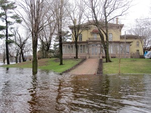 Water entirely surrounds the Villa Louis mansion on April 16, 2011, but the house remains well above the water level.