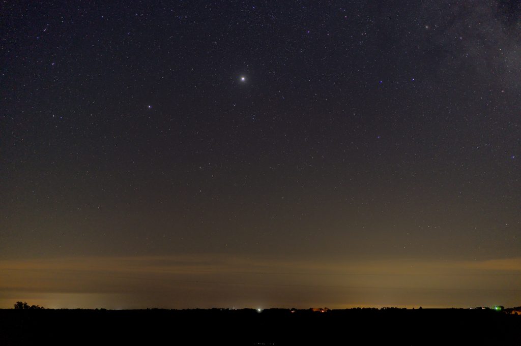 Jupiter is the brightest object in this photograph of the southern horizon. Saturn is also visible as a bright speck to the lower left of Jupiter. 